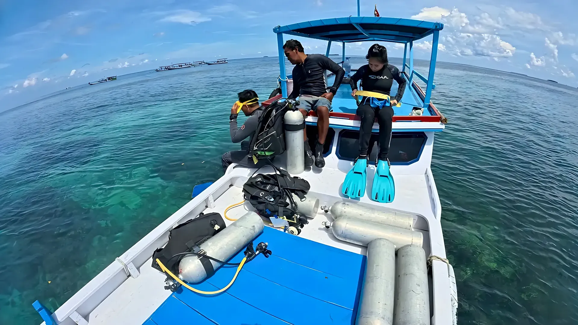 Dive boat and equipment over clear Karimunjawa water