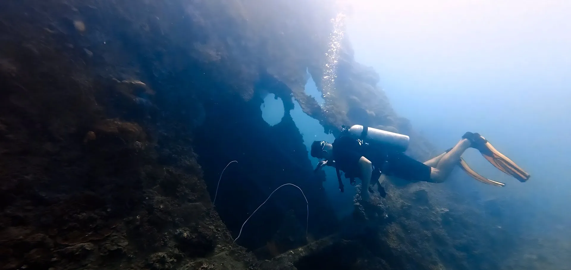 Diver exploring the Indonor wreck