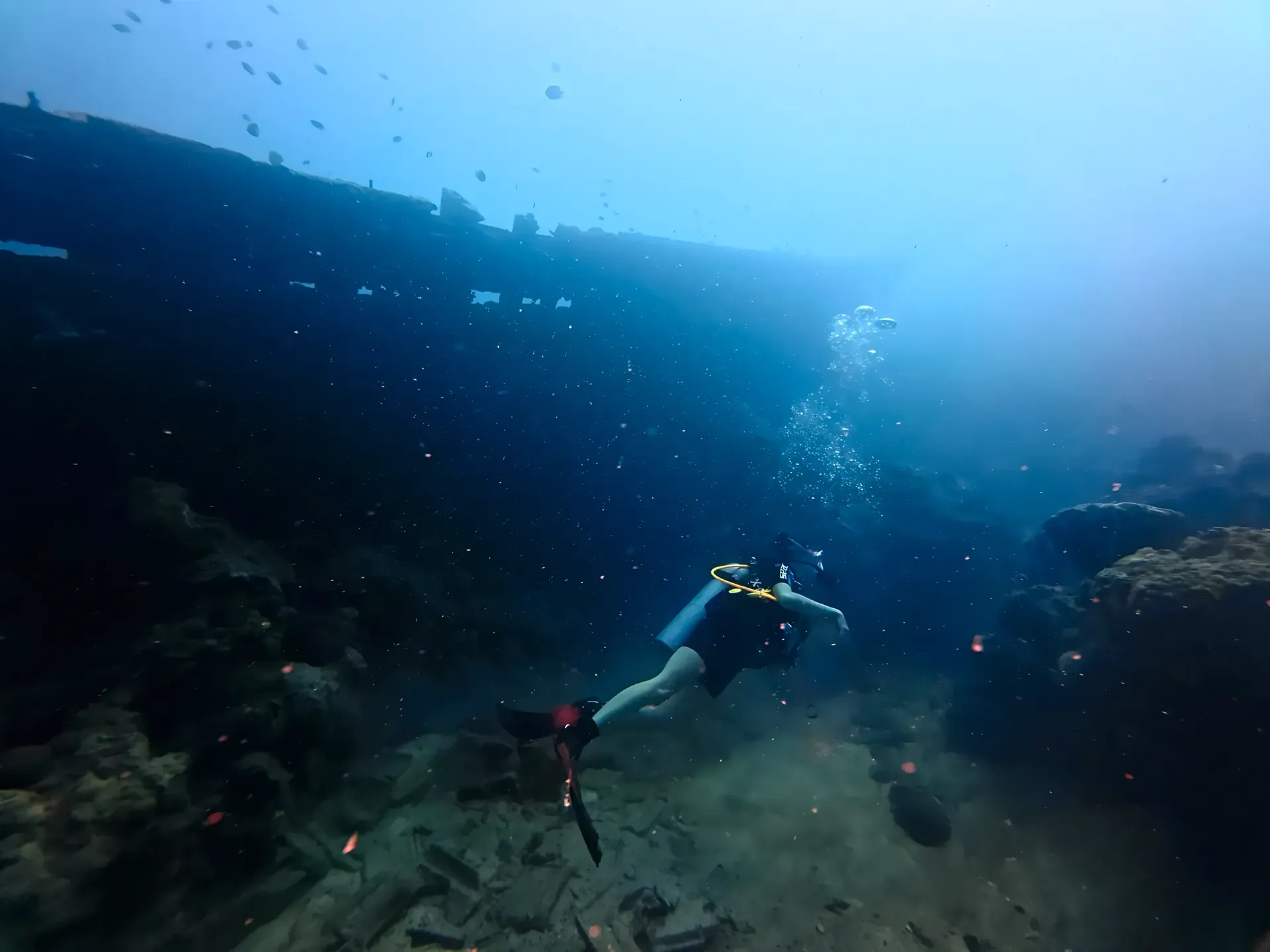 Diver at the Kenteng shipwreck