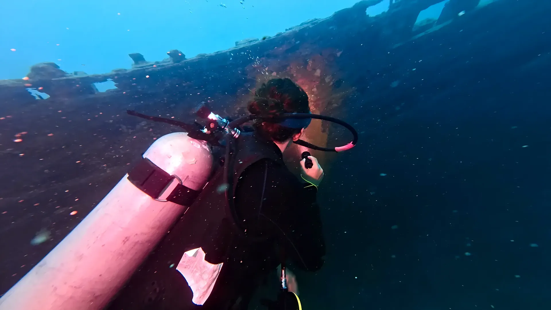 Diver exploring a shipwreck in Karimunjawa
